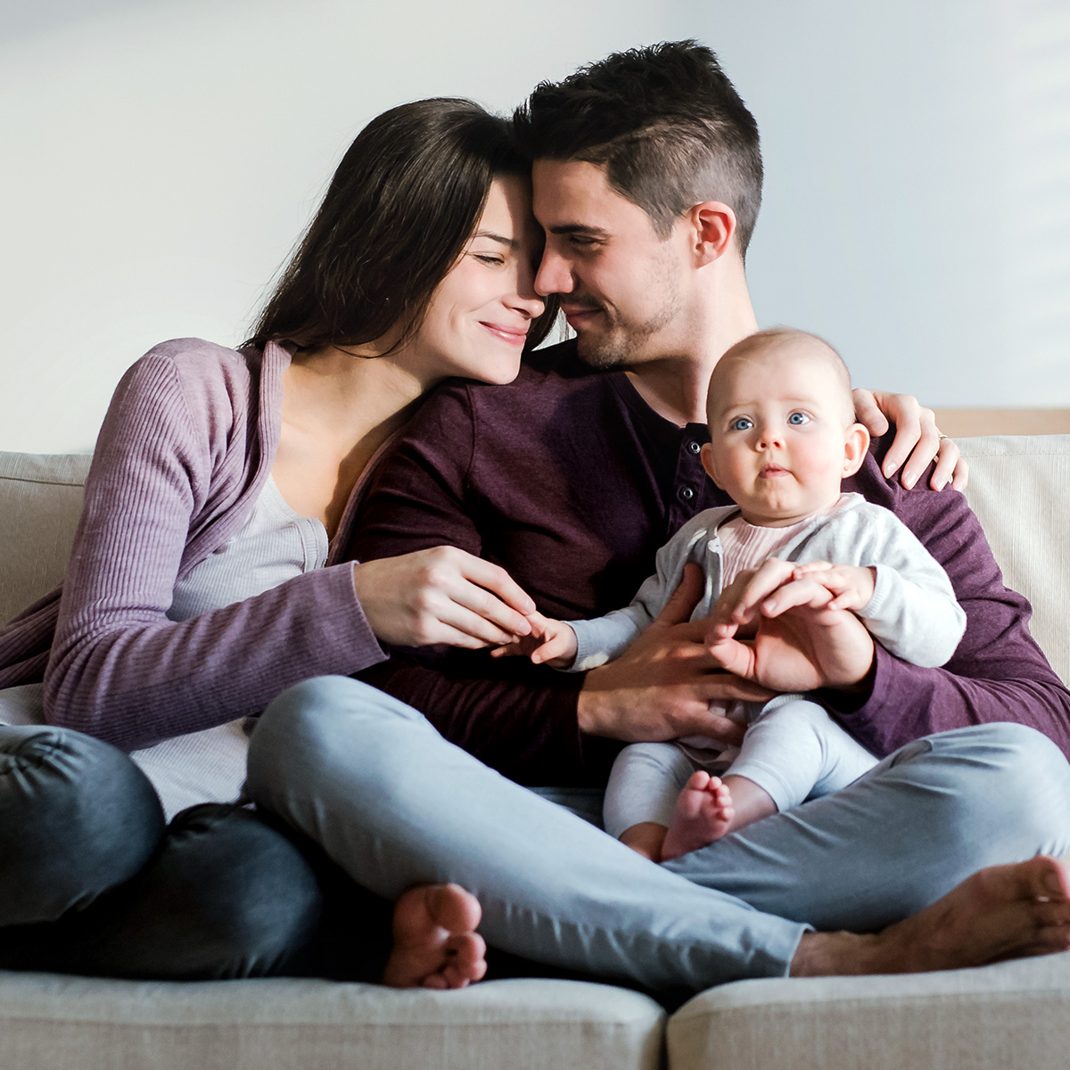 Family with Baby on Couch