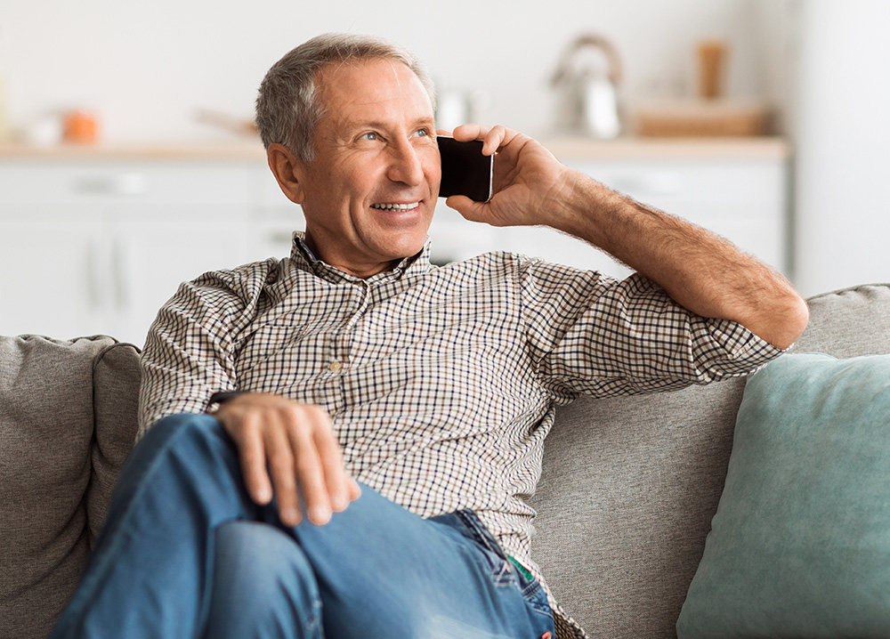 Older Man Talking on Phone