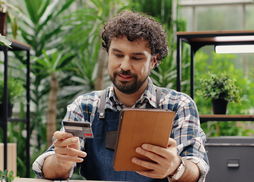 Man Using Business Credit Card to Purchase Supplies