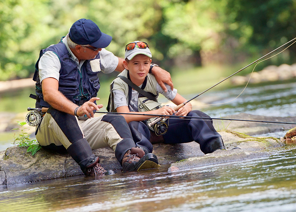 Grandfather and Grandson Fishing Together