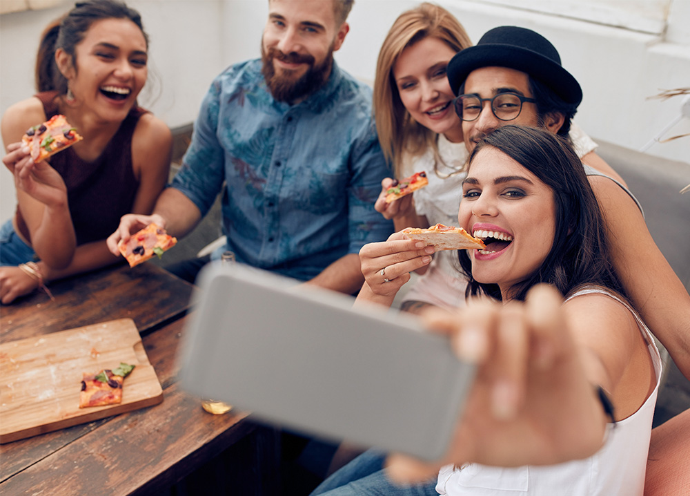 Group of Young Adult Friends Enjoying Dinner Together