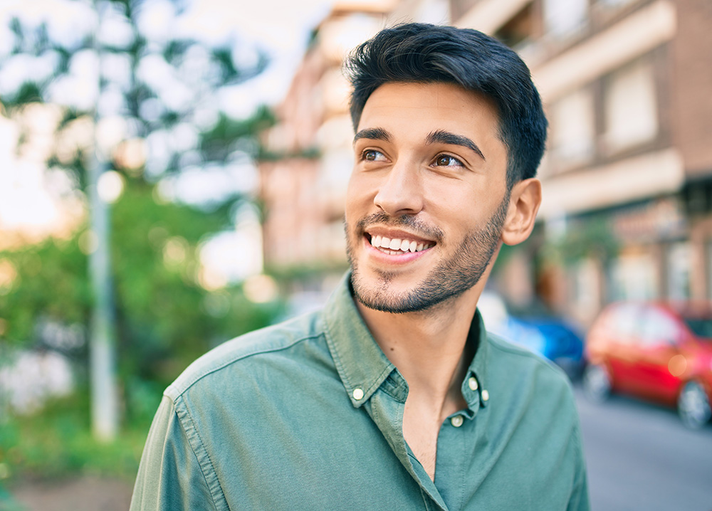 Young Man Smiling Looking Away