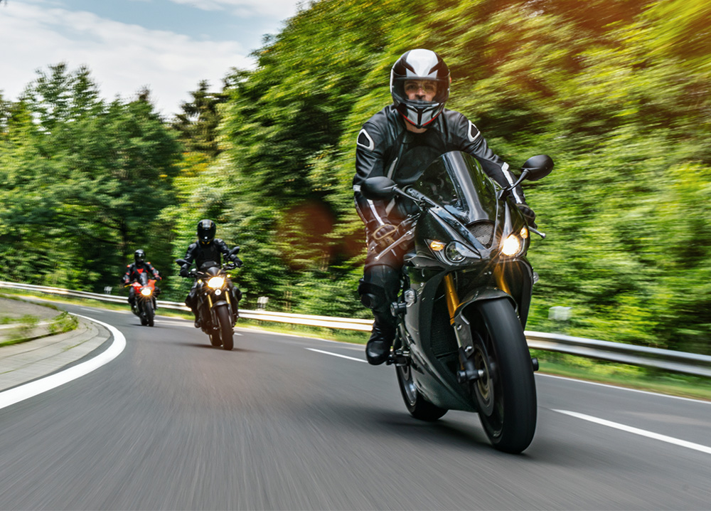 Young Men Riding on Motorcycles