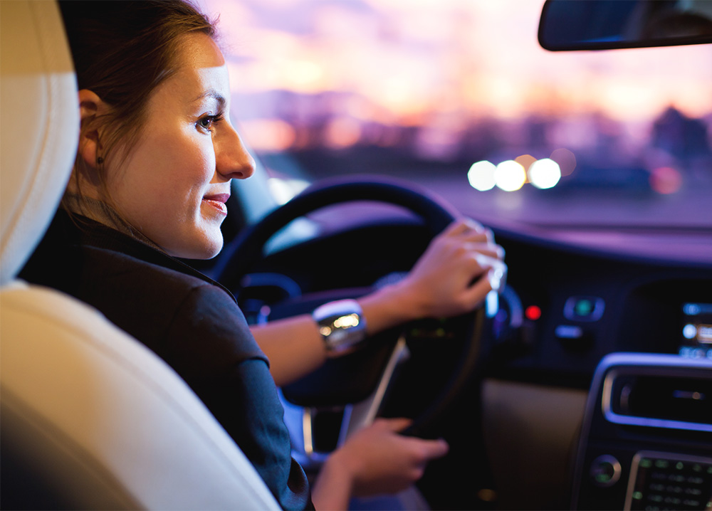 Woman Driving at Night