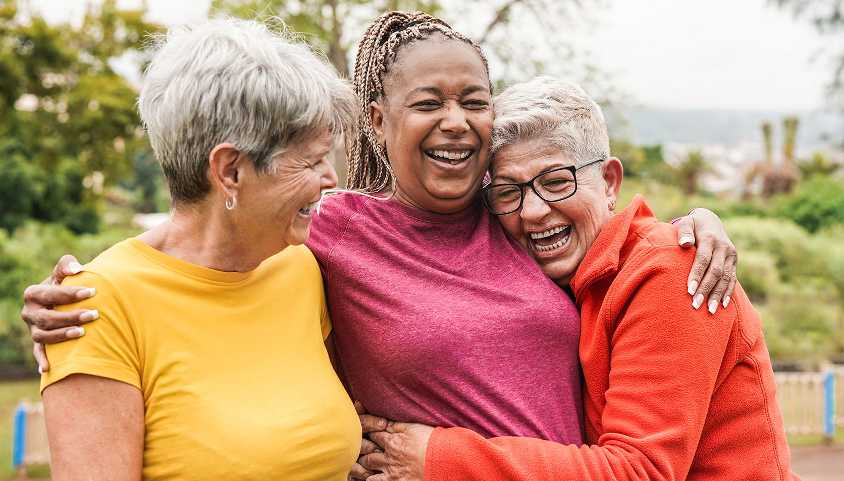 Three Older Women Hugging